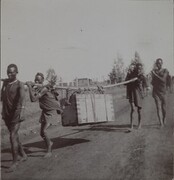 On the road to Nairobi. Brickhouse, Gallen-Kallela familyâ€™s home abroad, on the background. ; Photograph 2.