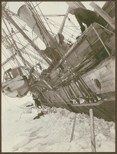 Ernest Shackleton & Frank Worsley watching the ice breaking up around the Endurance encased in ice 1915