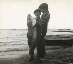 Hooking a big cod fish near Gascons, Quebec