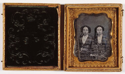 Daguerreotype. Portrait of two young women.