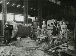 Women engaged in labouring work in dressing shop