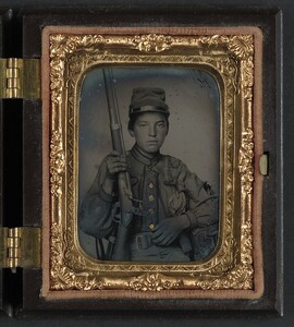 [Sergeant William T. Biedler, 16 years old, of Company C, Mosby's Virginia Cavalry Regiment with musket] (LOC)