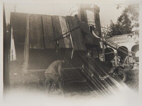 Studies for the Kalevala frescoes ready to be transported from TarvaspÃ¤Ã¤ to the National Museum of Finland, Akseli Gallen-Kallela with another man by the car, 1928. Print 2 of the picture 2.
