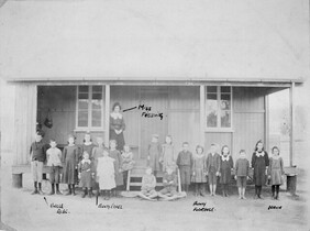 Schoolchildren and teacher outside the school at Drummers Creek Queensland 1908