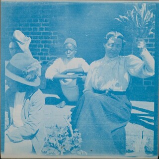 Mary and Jorma Gallen-Kallela with Paitaboy in front of Brickhouse. Kirsti Gallen-Kallela at the back holding a grapefruit.
