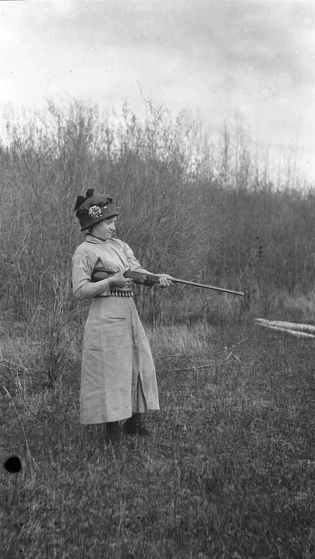 Woman with rifle