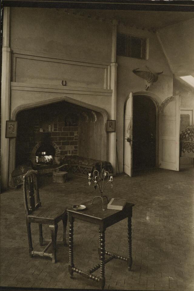 The atelier at TarvaspÃ¤Ã¤ after was cleaned following Akseli Gallen-Kallela's demise,  the side table in the image was originally from his atelier in Paris
